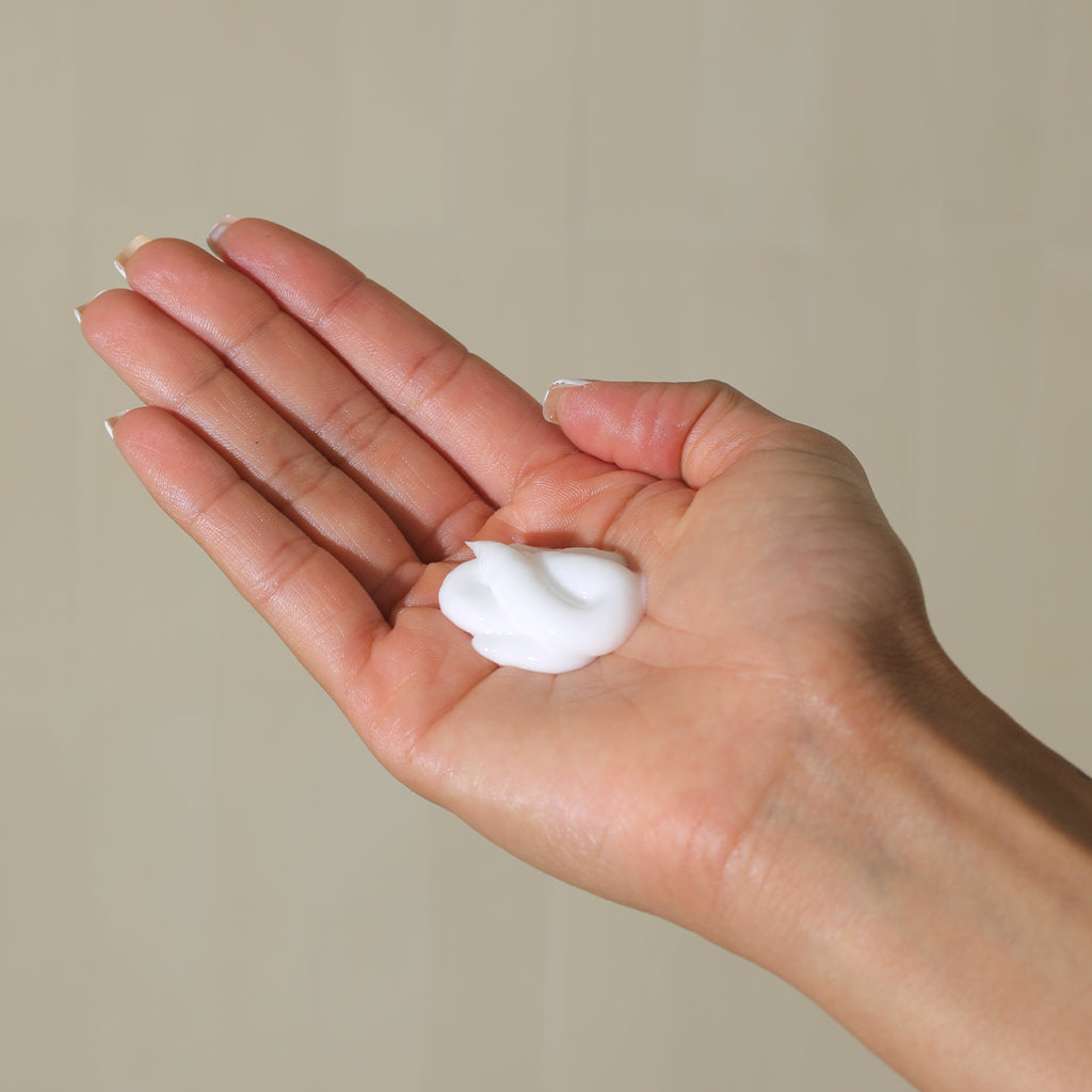 MinimLA Sandalwood Body Cream swatch in hand